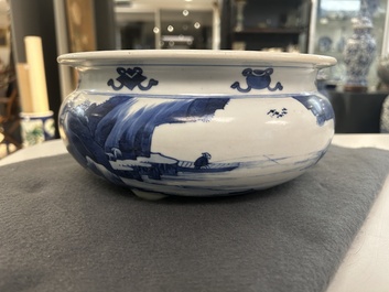A Chinese blue and white tripod censer with figures in a mountainous landscape, Kangxi