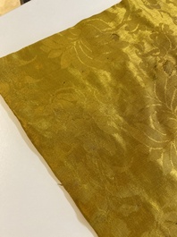 An imperial Chinese embroidered silk gold-thread yellow-ground cushion cover, 19th C.