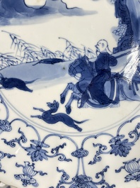 Three Chinese blue and white 'Mongolian hunt' plates, Chenghua mark, Kangxi