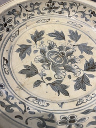 A Vietnamese or Annamese blue and white dish, a Thai Sawankhalok dish and a pair of celadon figures, 14th C. and later
