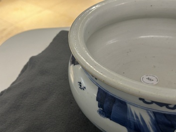 A Chinese blue and white tripod censer with figures in a mountainous landscape, Kangxi