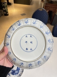 Three Chinese blue and white 'Mongolian hunt' plates, Chenghua mark, Kangxi