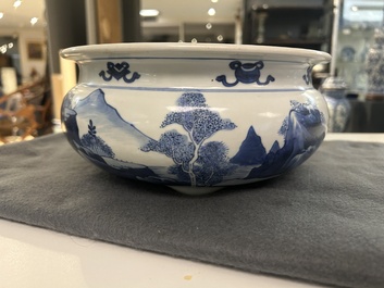 A Chinese blue and white tripod censer with figures in a mountainous landscape, Kangxi