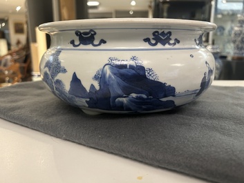 A Chinese blue and white tripod censer with figures in a mountainous landscape, Kangxi