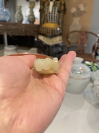 A Chinese white and russet jade sculpture of two boys, Qing