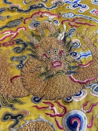 An imperial Chinese embroidered silk gold-thread yellow-ground cushion cover, 19th C.