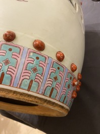 A Chinese famille rose garden seat with ladies in a garden, 20th C.