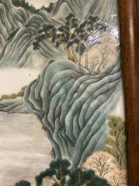 A Chinese famille verte plaque mounted in a wooden table screen, signed Li Huan 李澣, dated 1924