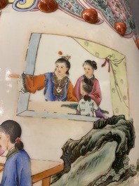 A Chinese famille rose garden seat with ladies in a garden, 20th C.