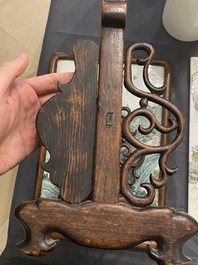 A Chinese famille verte plaque mounted in a wooden table screen, signed Li Huan 李澣, dated 1924
