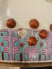 A Chinese famille rose garden seat with ladies in a garden, 20th C.