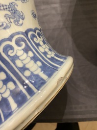 A Chinese blue and white 'dragons and phoenixes' vase and cover, Kangxi mark, 19th C.