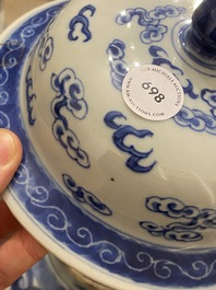 A Chinese blue and white 'dragons and phoenixes' vase and cover, Kangxi mark, 19th C.