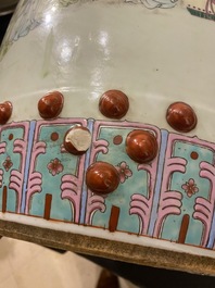 A Chinese famille rose garden seat with ladies in a garden, 20th C.