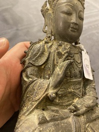 A Chinese bronze Buddha and a peach-shaped incense burner, Ming and Qing