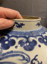 A Chinese blue and white 'dragons and phoenixes' vase and cover, Kangxi mark, 19th C.