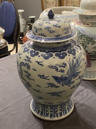 A Chinese blue and white 'dragons and phoenixes' vase and cover, Kangxi mark, 19th C.