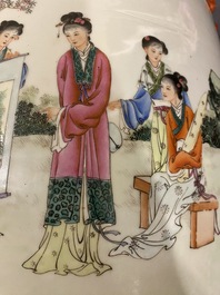 A Chinese famille rose garden seat with ladies in a garden, 20th C.