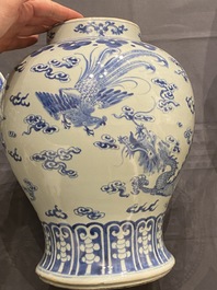 A Chinese blue and white 'dragons and phoenixes' vase and cover, Kangxi mark, 19th C.