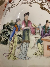 A Chinese famille rose garden seat with ladies in a garden, 20th C.