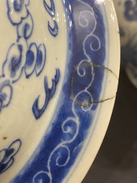A Chinese blue and white 'dragons and phoenixes' vase and cover, Kangxi mark, 19th C.
