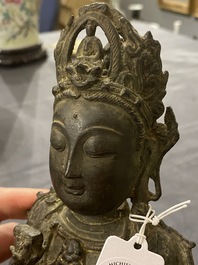A Chinese bronze Buddha and a peach-shaped incense burner, Ming and Qing