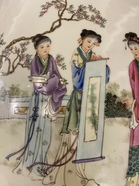 A Chinese famille rose garden seat with ladies in a garden, 20th C.