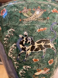 A pair of Chinese famille verte 'galloping horses' vases and covers, 19th C.