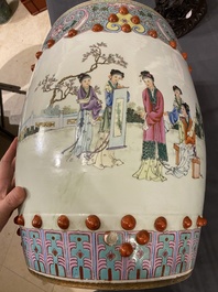A Chinese famille rose garden seat with ladies in a garden, 20th C.