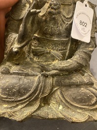 A Chinese bronze Buddha and a peach-shaped incense burner, Ming and Qing