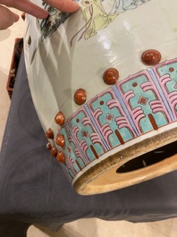 A Chinese famille rose garden seat with ladies in a garden, 20th C.