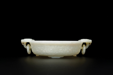 An important Chinese chrysanthemum-shaped very pale celadon jade marriage bowl, 18th C.