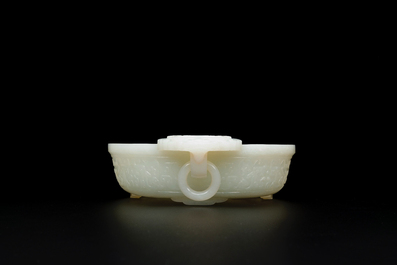 An important Chinese chrysanthemum-shaped very pale celadon jade marriage bowl, 18th C.