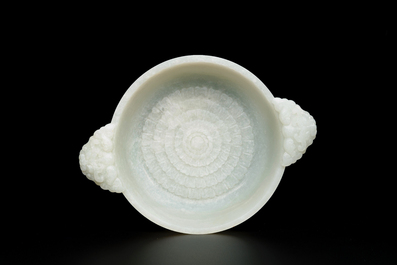 An important Chinese chrysanthemum-shaped very pale celadon jade marriage bowl, 18th C.