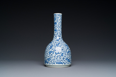 A Chinese blue and white 'lotus scroll' bottle vase, Yongzheng mark and possibly of the period
