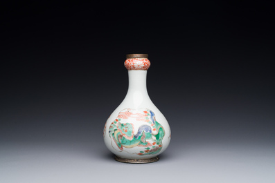 A Chinese famille verte 'qilin' vase with silver mounts, Kangxi