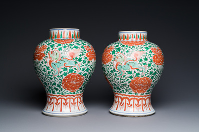 A pair of Chinese famille verte 'Buddhist lion' vases with gilt bronze mounts, Kangxi