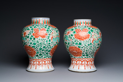 A pair of Chinese famille verte 'Buddhist lion' vases with gilt bronze mounts, Kangxi