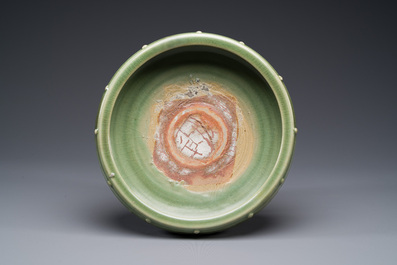 A Chinese Longquan celadon tripod censer on wooden stand, Yuan/Ming