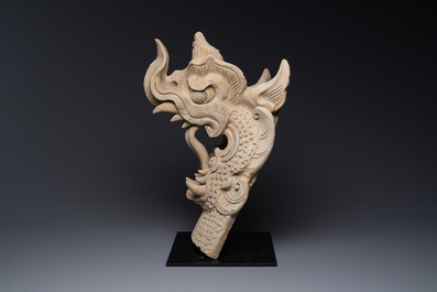 A Chinese pottery dragon head architectural tile, Song/Jin