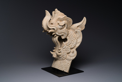 A Chinese pottery dragon head architectural tile, Song/Jin