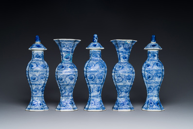 A Chinese blue and white garniture of five vases with floral design, Kangxi