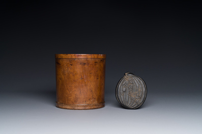 A Chinese huanghuali wooden brushpot and a melon-shaped lacquer box and cover with '18 Luohan' relief design, 19/20th C.