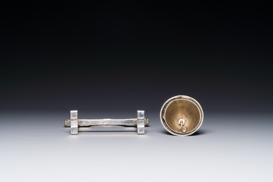 A fine parcel-gilt silver table bell or miniature gong, Southeast Asia, early 20th C.
