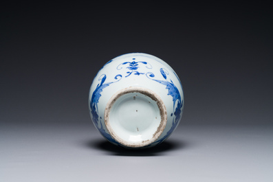 A Chinese blue and white ewer with landscape design, Transitional period