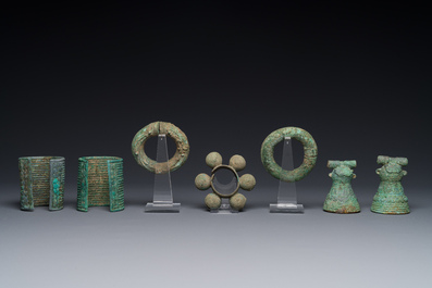 A collection of bronze bracelets and animal bells, Vietnam and Cambodia, 4th/1st C. B.C
