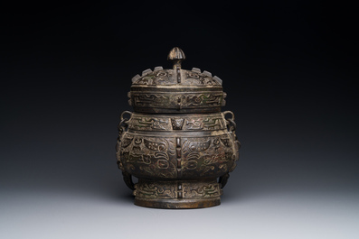 A Chinese bronze ritual wine vessel and cover, 'you', Yuan/Ming