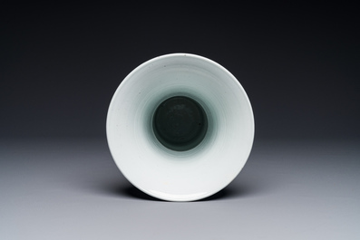 A Chinese blue and white 'chrysanthemum scroll' 'gu' vase, Kangxi