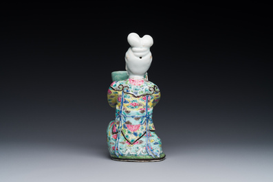 A Chinese famille rose figure of a lady with a bowl, Yongzheng
