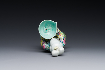 A Chinese famille rose figure of a lady with a bowl, Yongzheng